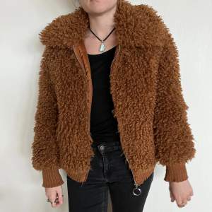 Comfy furry jacket. 🧸It feels very soft at touch and the fit is normal. And puffy. 😊Suitable for autumn, winter, and spring.  Condition: like new, worn only a couple of times. Size: ( EUR S). The fitting could work with an M too. 