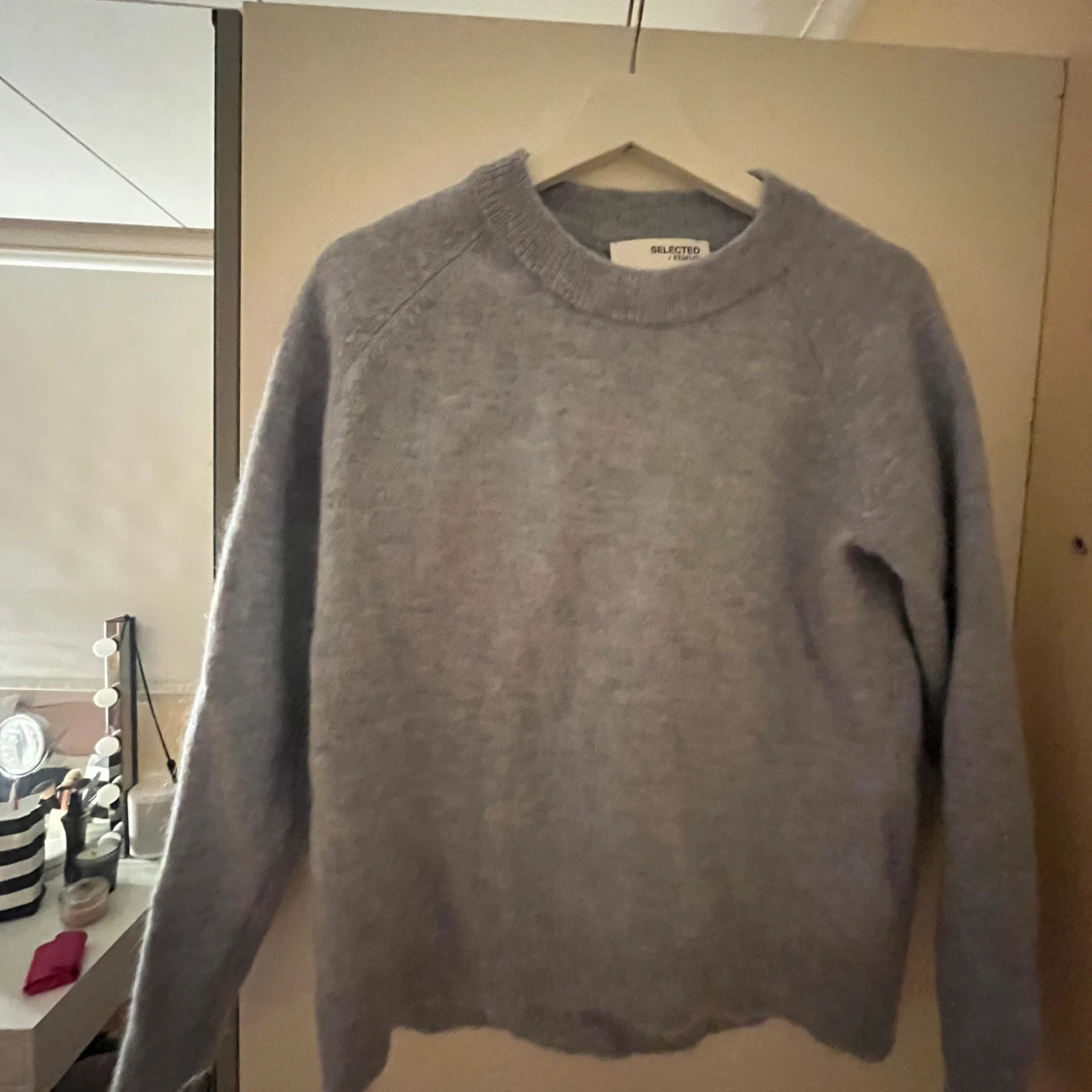 Ljusblå tjocktröja