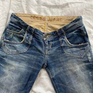 jeans från cross i storlek W26 L34
