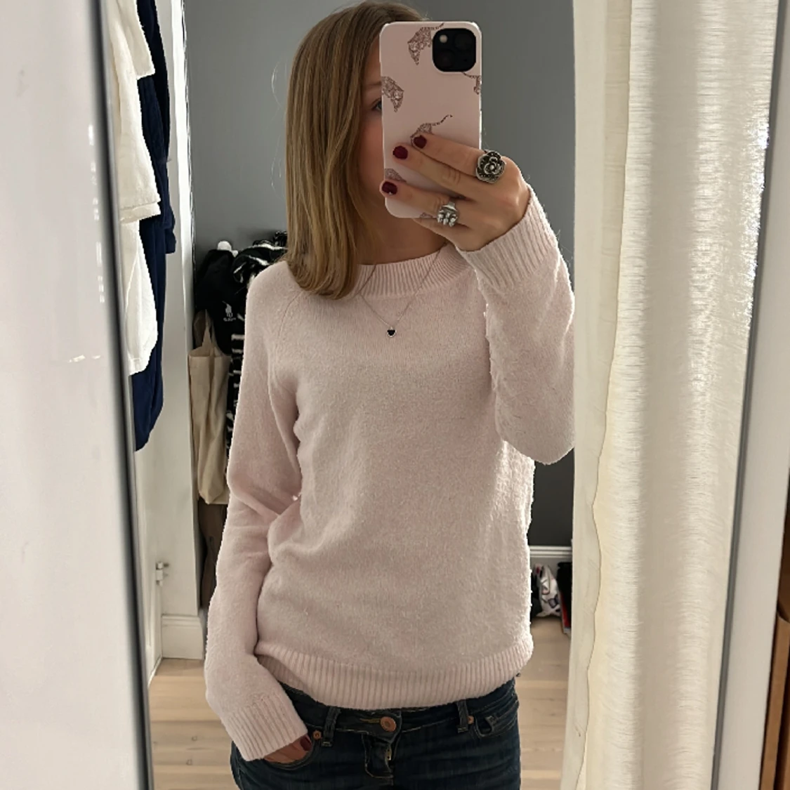 Ljusrosa stickad tröja