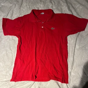 Lacoste polo shirt - Det är helt ok skick storlek L