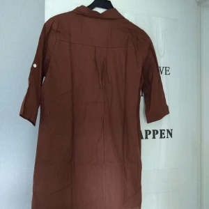 Skjortklänning  - Helt ny. Generös passform 