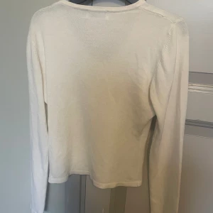 Vit tröja - Vit tröja från Top Shop i storlek 36.