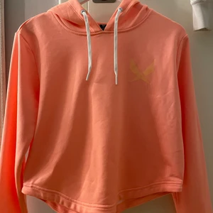 Tränings tröja i neon orange  - Helt oanvänd tränings tröja 