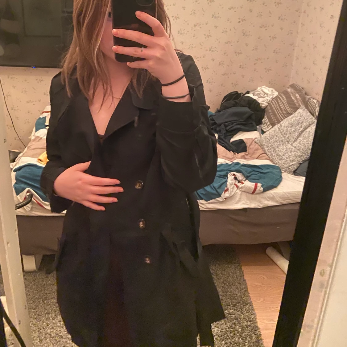 En kappa från Finejo i storlek XL