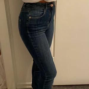 Slim high jeans  - Blåa jeans från Lindex i storlek EU34 