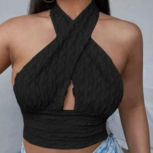 Snygg topp  - Kort stretchig topp jag fått av en vän som jag aldrig använt utan endast provad. Skulle kunna passa en S och en M. Frakt tillkommer och skriver fraktpris på PM