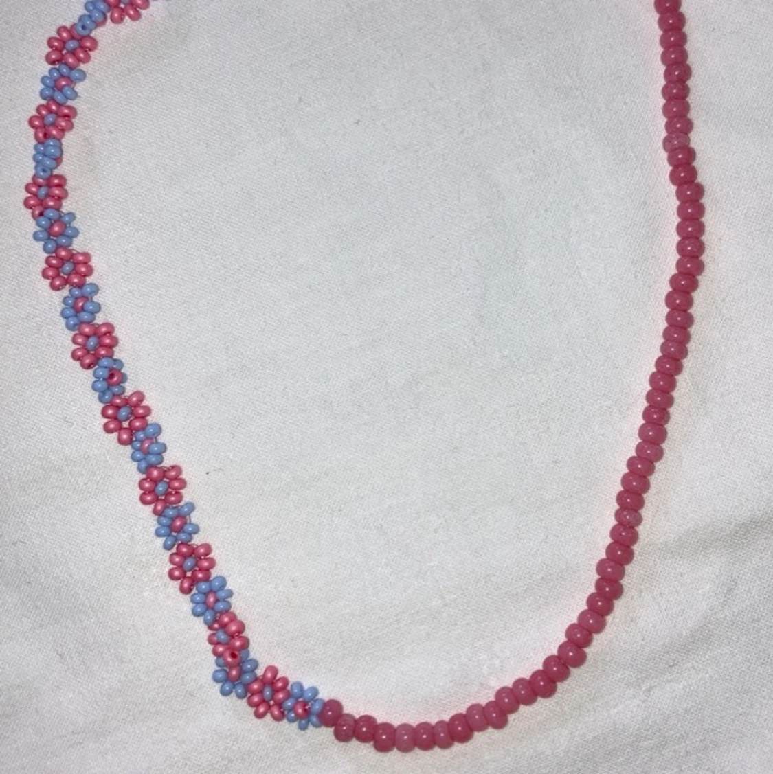 Halsband blommor - 90