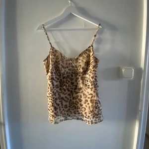 Leopard linne  - linne i blus material