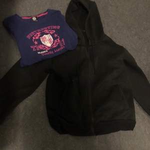 Svart peak linne (XL) Svarta jeans, lite urtvättade.(XS) Blå T-Shirt med rosa detaljer(XS) Svart zip up hoodie(S) Svart och Lila kjol med detaljer (XS)