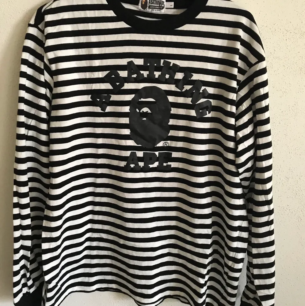 Unisex Bape / A Bathing Ape Striped Long Sleeve T-Shirt  Size large, fits like a regular men’s medium. Great condition, no flaws or damage.  DM if you need exact size measurements.   Buyer pays for all shipping costs. All items sent with tracking number.   No swaps, no trades, no offers. . T-shirts.