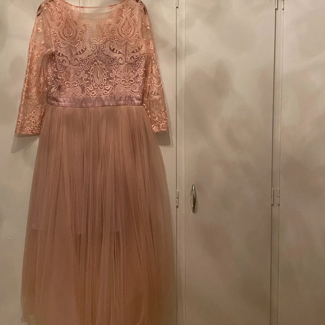 En rosa klänning i storken M - 90