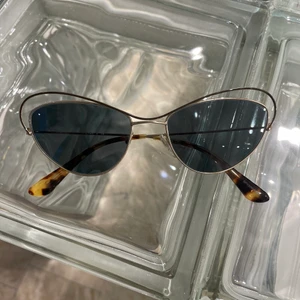 ‘Prada’ sunglasses - A couple very small scratches, not noticeable:)