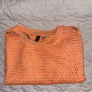 En fin mesh tröja i storlek XS. Aldrig använd :) 