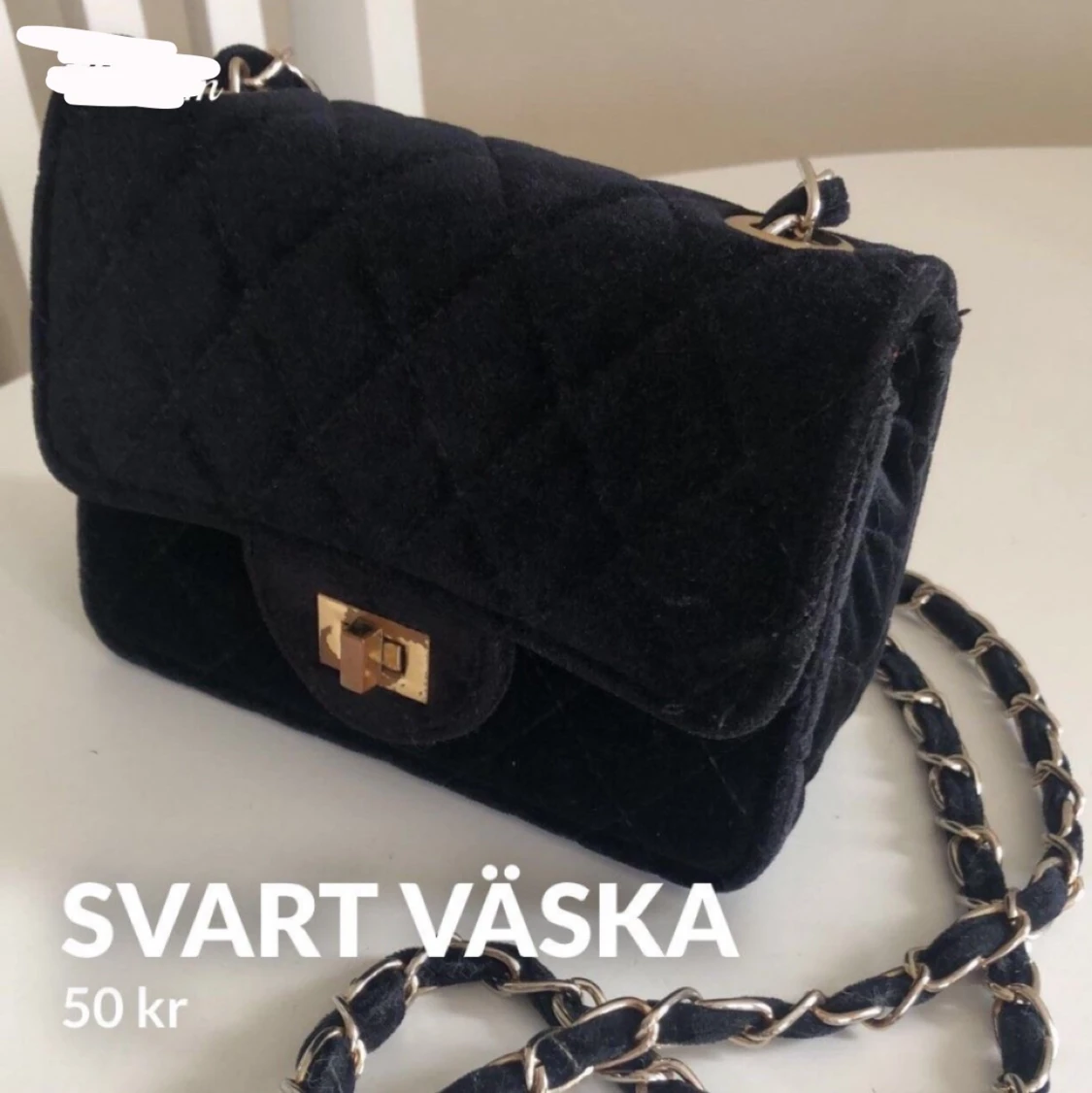 Svart väska