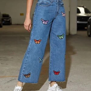 High waisted butterfly wide leg jeans - Bekväma och bra kvalitet 