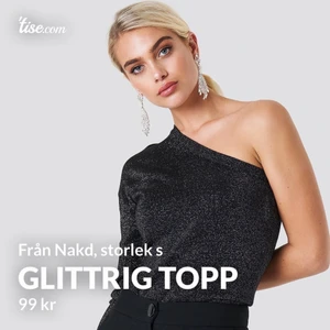 Glittrig One shoulder topp - Helt oanvänd one shoulder topp från nakd i storlek S!! Jättesnygg 💥💥