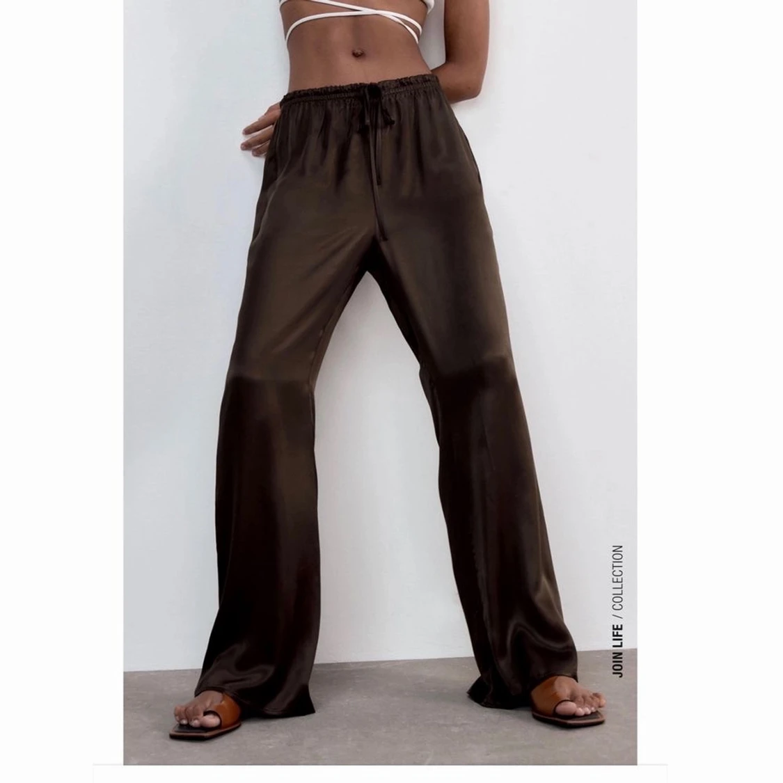 Bruna glättade byxor zara