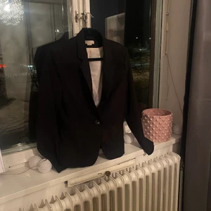 Kavaj - Svart kavaj i använt skick