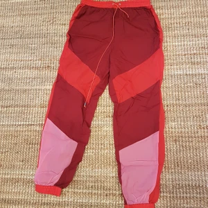 Bik bok trackpants  - Red running trackpants. Made as an extra layer, as they're a little bit see through.