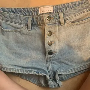 American Apparel button up denim shorts.Size 28. Great condition. Bought in wrong size.Bought in Barcelona American Apparel store.Made in the USA.