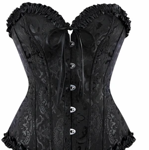 Korsett - Svart korsett som bara är använd 2 gånger i storlek s men jag som har xs kan spänna väldigt tight