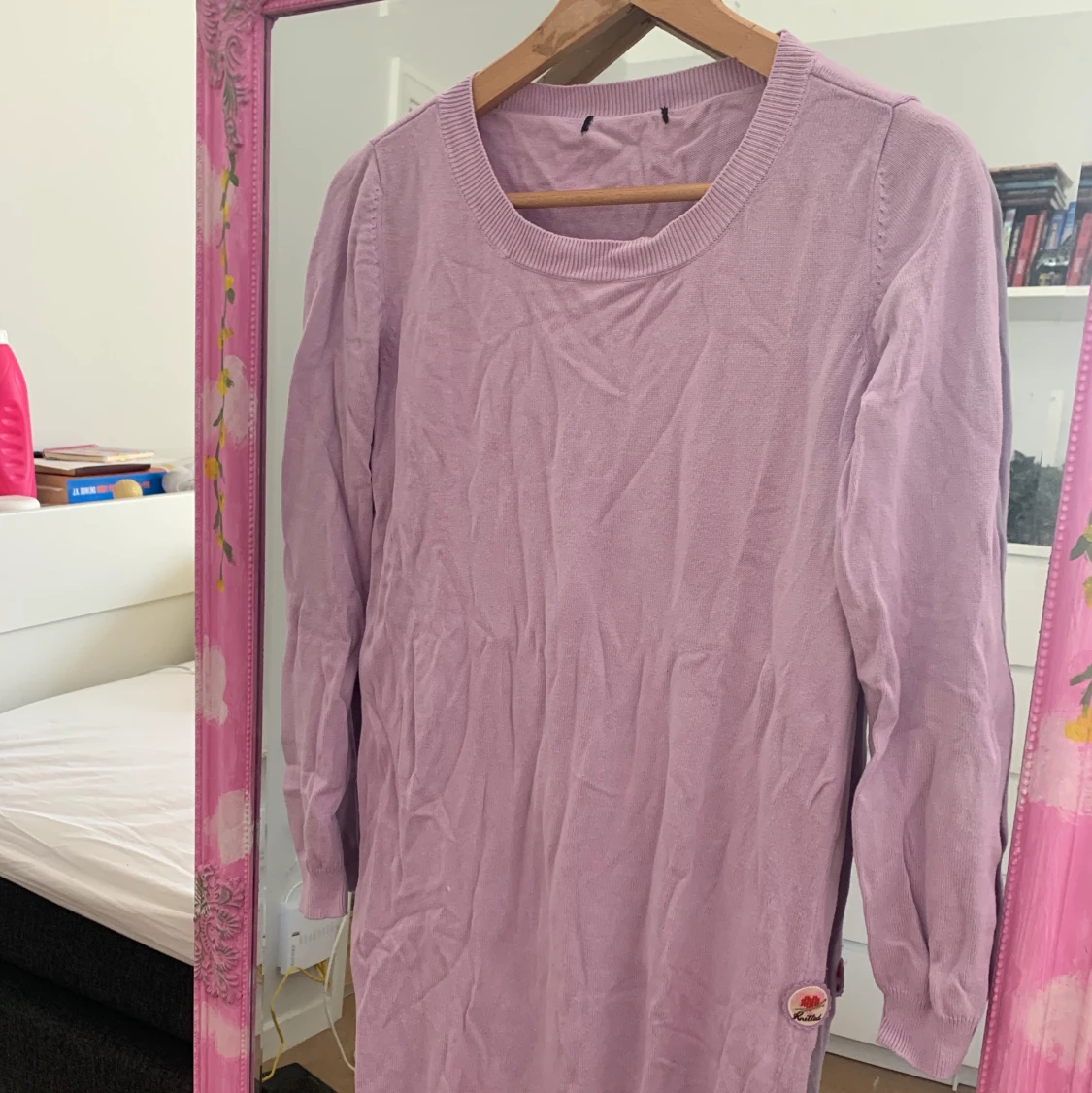 Långärmad stickad klänning