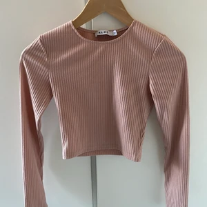 Rosa topp.  - En rosa topp från Nelly. 