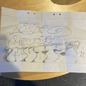 Nutte one og graffity skiss - En graffity skiss gjord av nutte one på randigt A4,ny skick