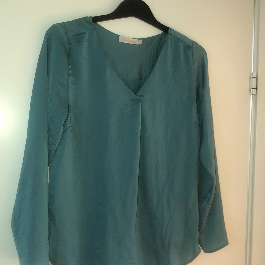 Turkos långärmad blus i silkesmaterial slt 38 - 91