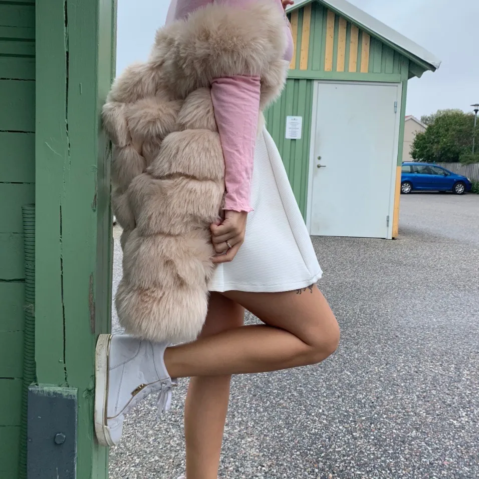 long length faux fur gilet in blush pink. . Jackor.