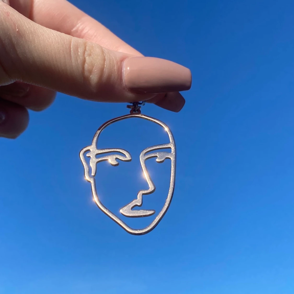 Ansikte örhängen - 90