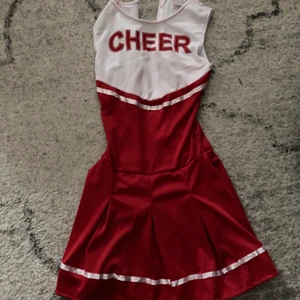Cheerleader klänning 34 - Stl 34 Ny, Denna med pompoms 130