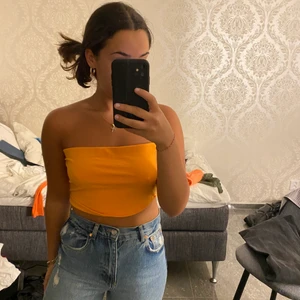 Ornage linne utan band - En super fin orange som är som en topp utan band!!