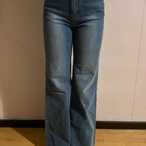 Dr Denim jeans i nyskick, bootcut, högmidjade
