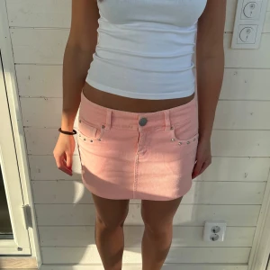 Jeanskjol korall - Så fin korallrosa jeanskjol i storlek 34