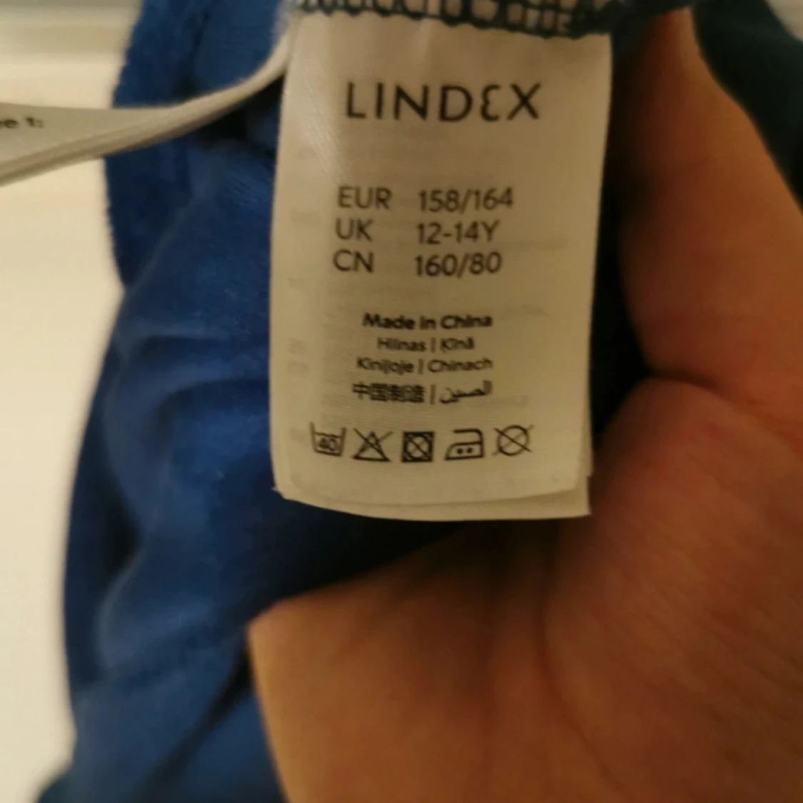 Blå t-shirt med krage från Lindex - 3