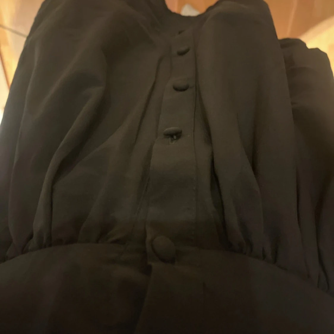 Svart axelbandslös klänning från Jeane Blush - 1