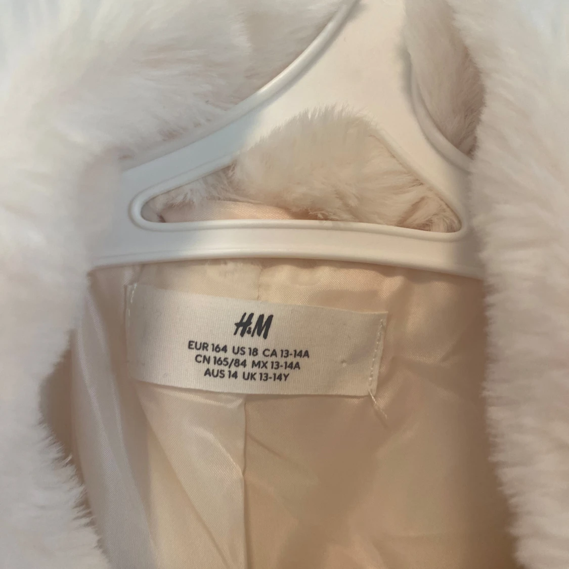 Vit pälsjacka från H&M, strl 164 - 1