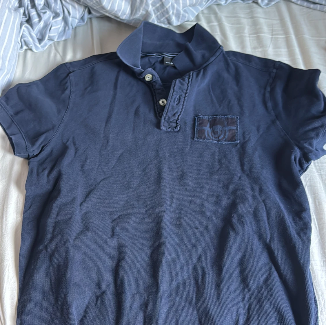 Mörkblå pikétröja från Sail Racing - 1