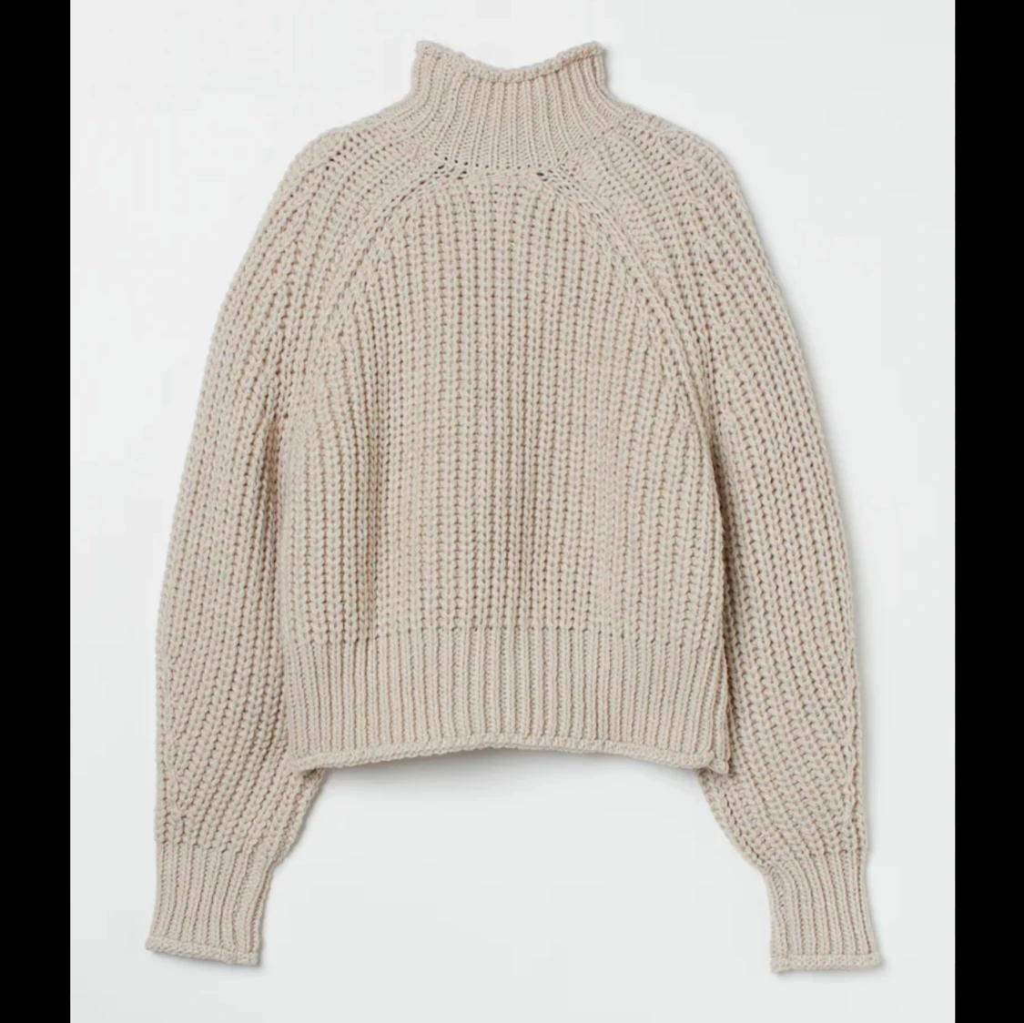 Vit stickad polotröja från H&M