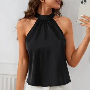 Svart halterneck topp i satin - Svart halterneck topp i glansigt satinmaterial.