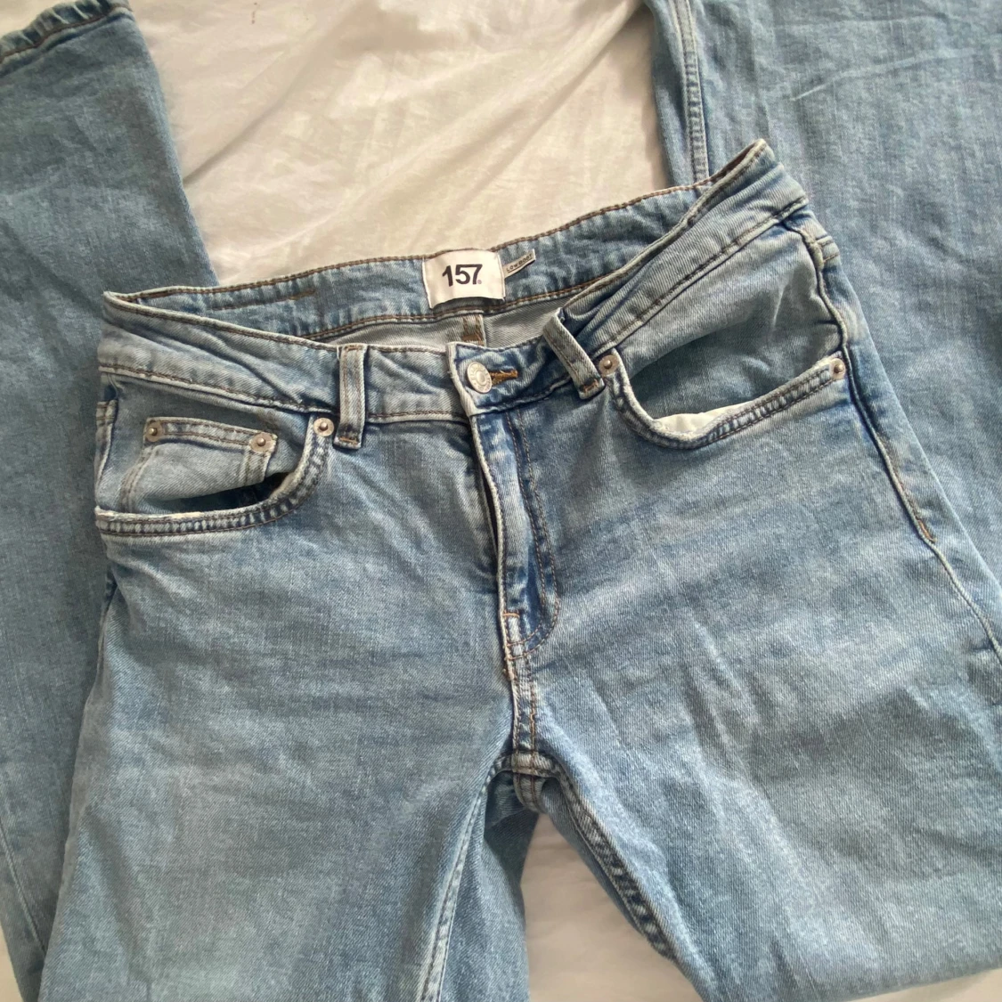 Ljusblå bootcut jeans från 157 - 1