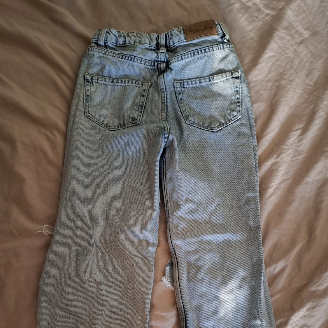 Ljusblå ripped jeans Denim Day 140 - 1