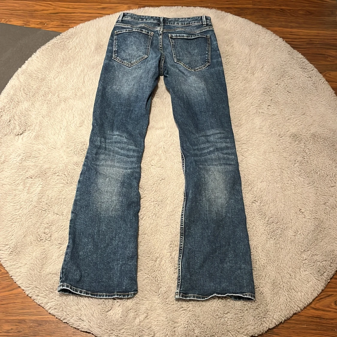 Blå lågmidjade bootcut jeans  - 1
