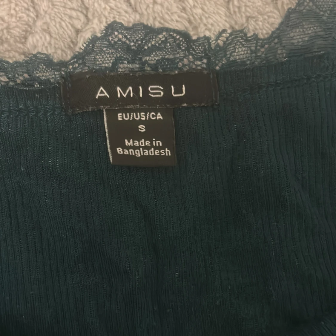 Mörkgrön linnetopp från Amisu  - 2