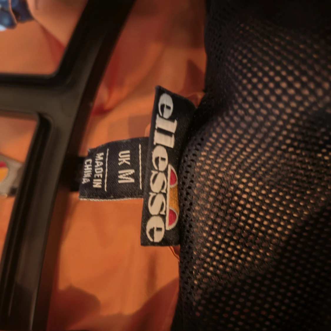 Orange vindjacka från Ellesse M - 1