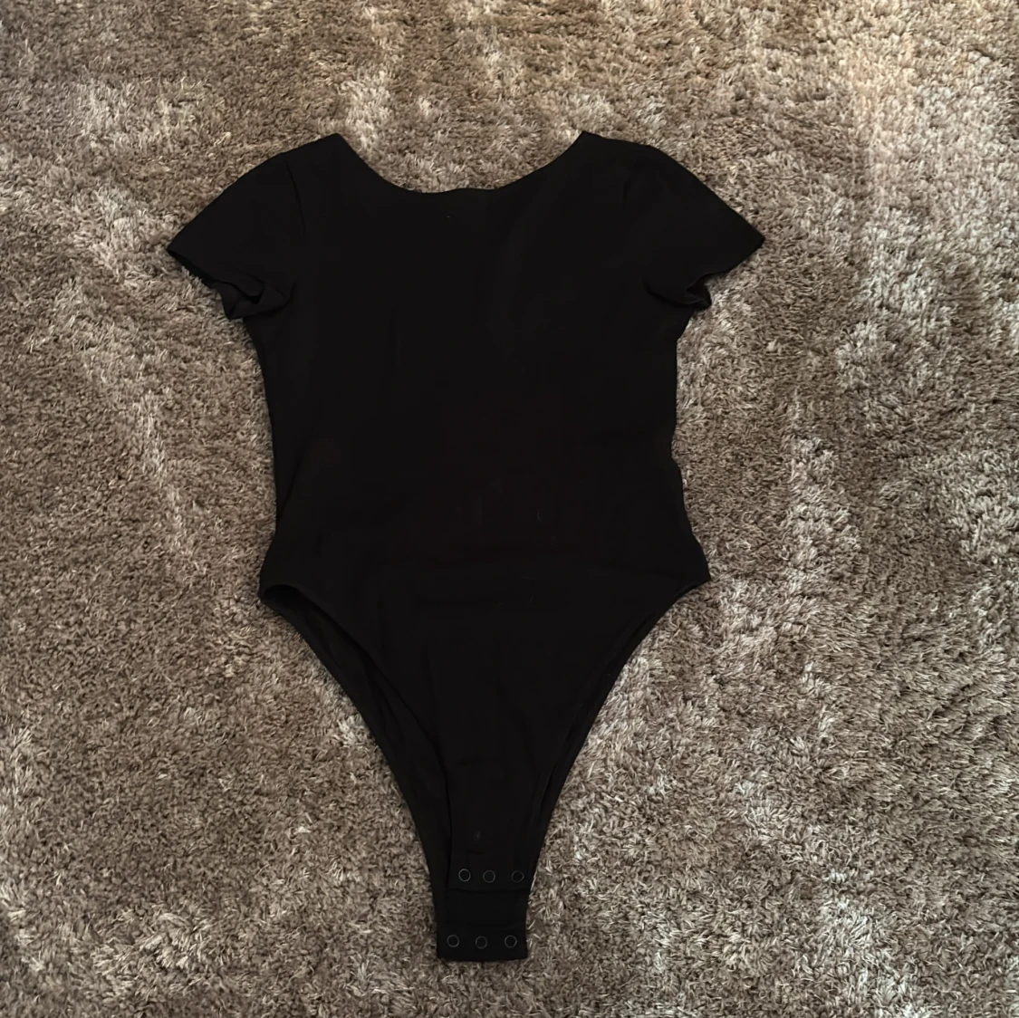 Svart body från H&M Divided, S
