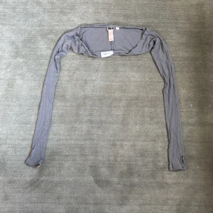 Axelvermare - En axelvärmare från bloch i jättebra skick i storlek S/M