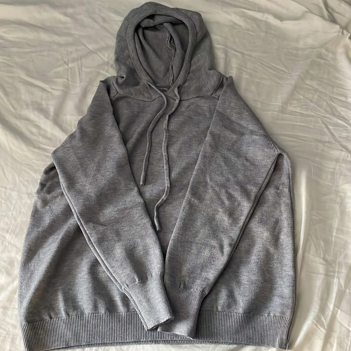 Grå merinoull luvtröja